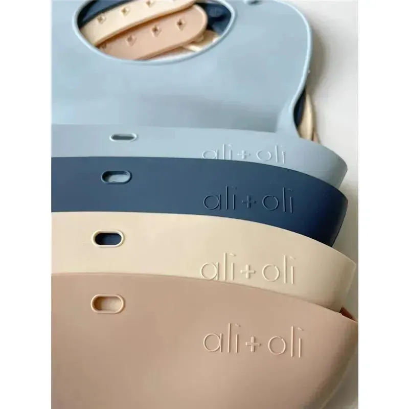 Ali   Oli Silicone Baby Bib Roll Up & Stay Closed (Sand)